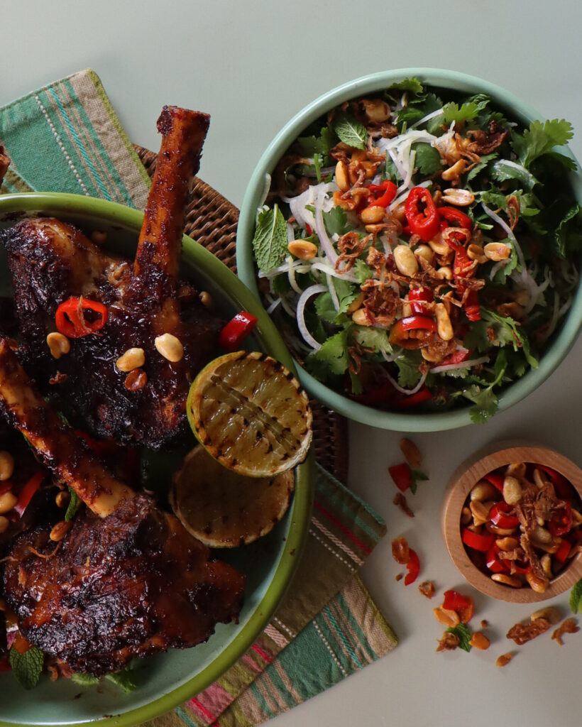 Get ready to savour the deliciousness! BBQ massaman curry lamb shanks topped. Served with Thai Green Pawpaw salad and extra peanut mix topping on the side.