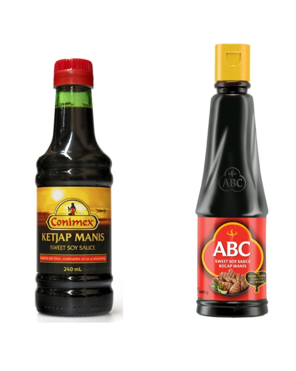 Two bottles of different brands of Ketjap Manis or sweet soy sauce.