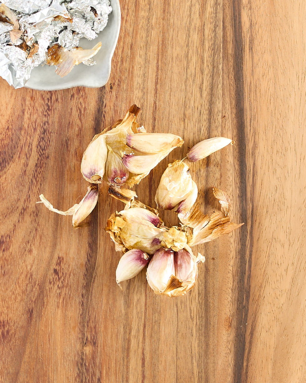 Bulb of roasted garlic removed from the discarded al-foil.