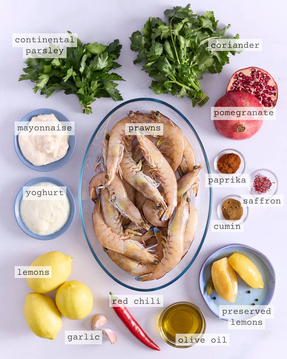 Chermoula prawn ingredients on a white bench top.
