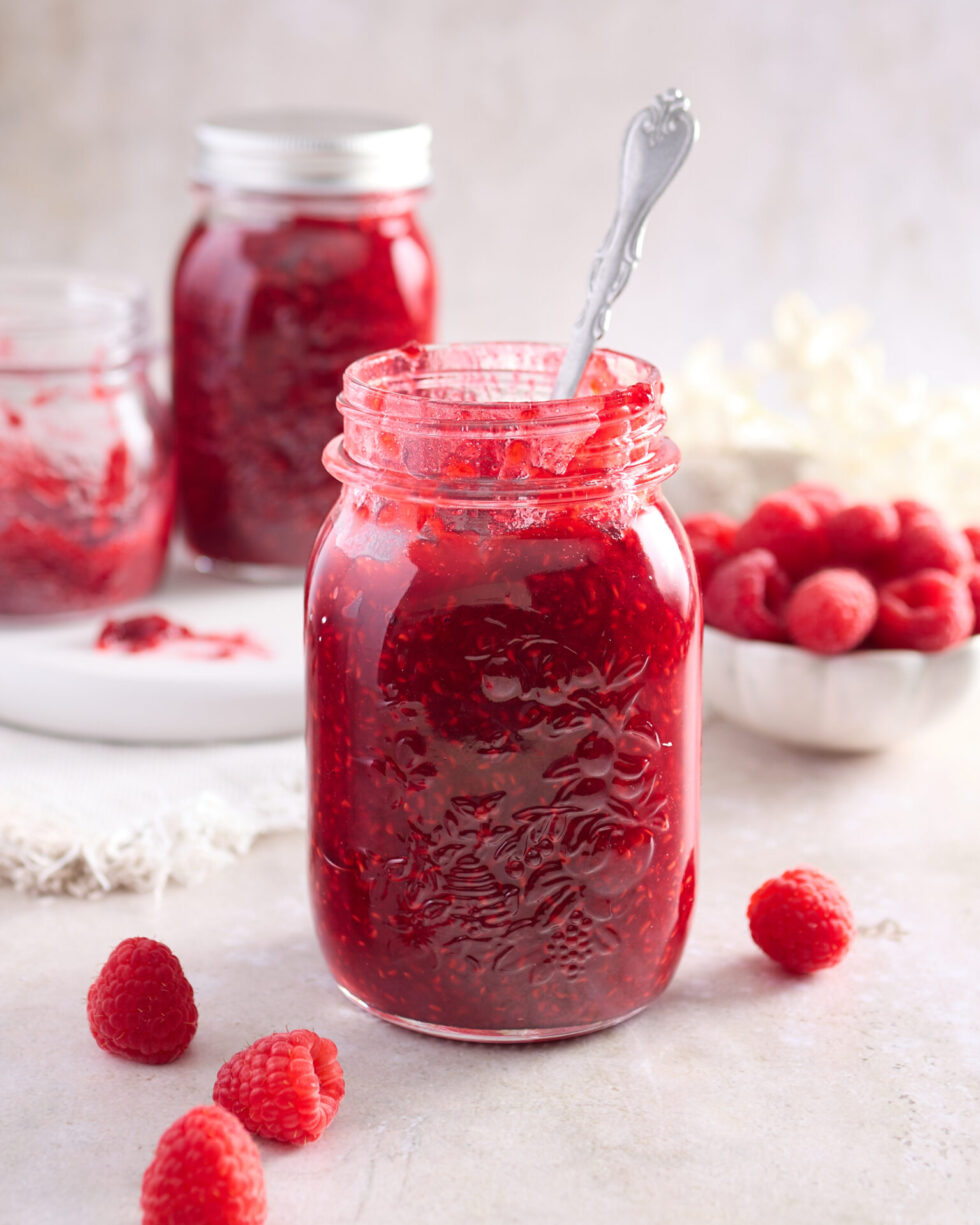 Jarred and ready to enjoy low sugar raspberry jam.